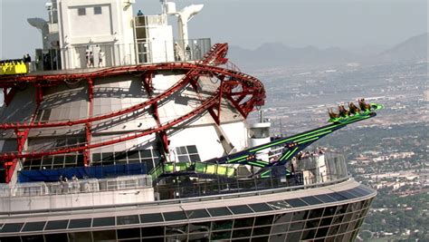 vegas roller coaster on top of building.